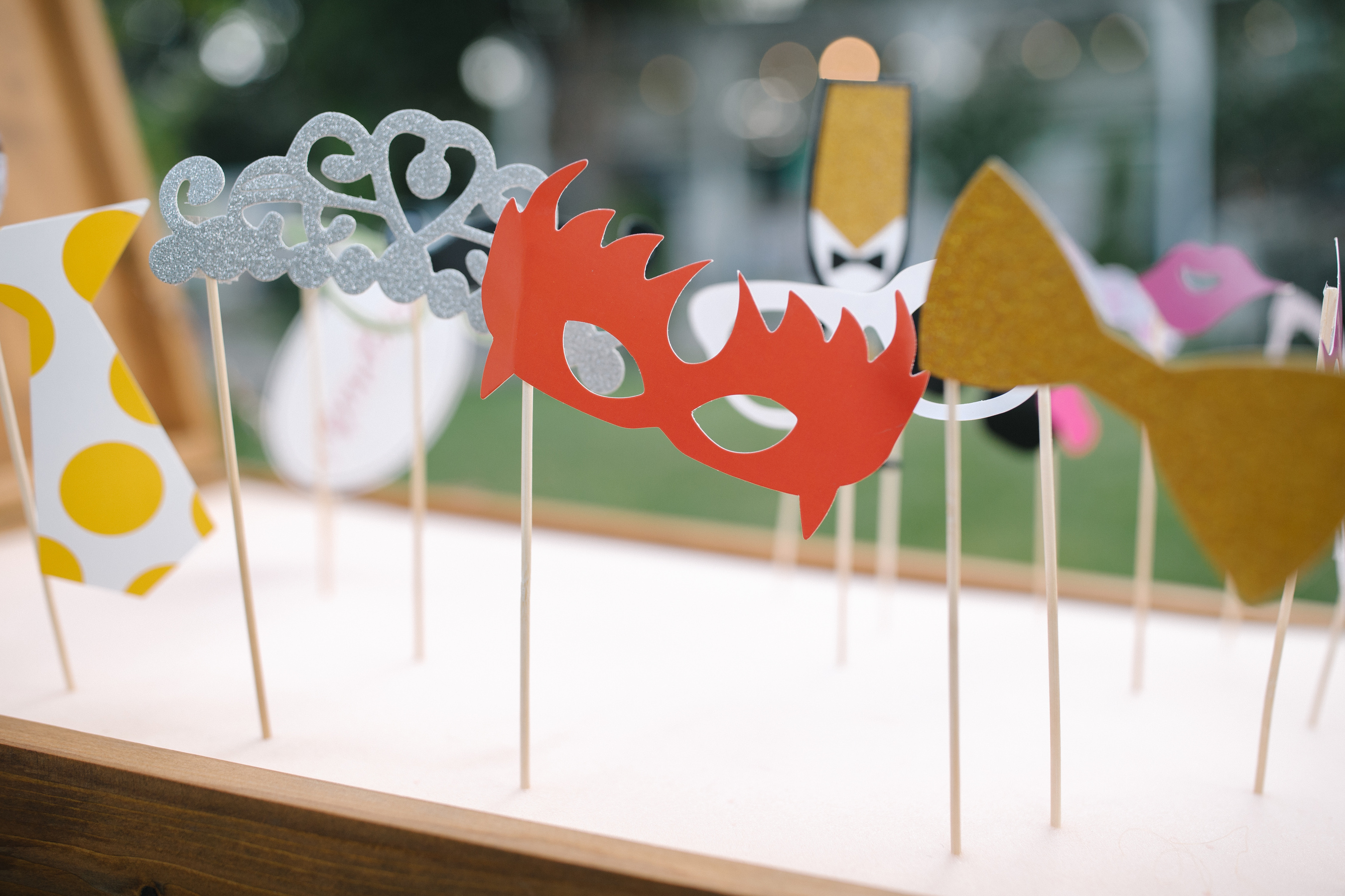 Box with photo booth props shot outdoors